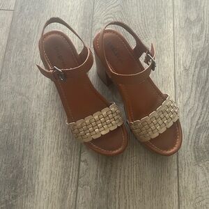 Adorable gold/brown wedge heels.